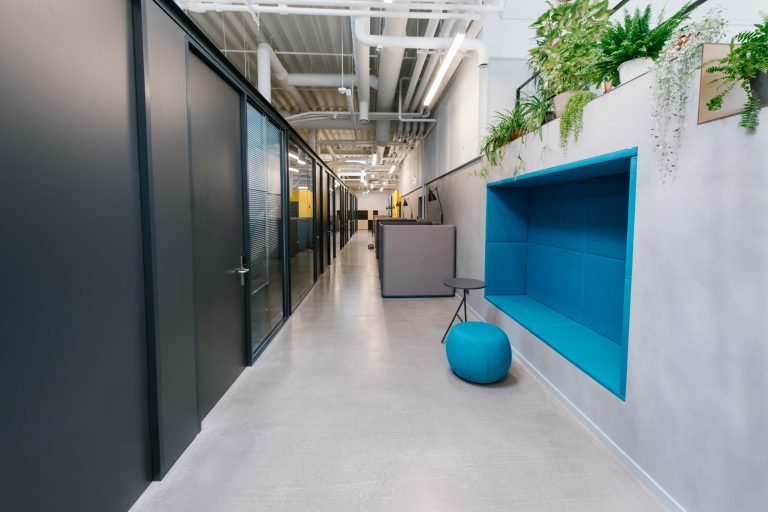 Hallway of modern office with colourful elements